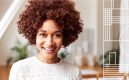 Smiling woman thinking about her dream home