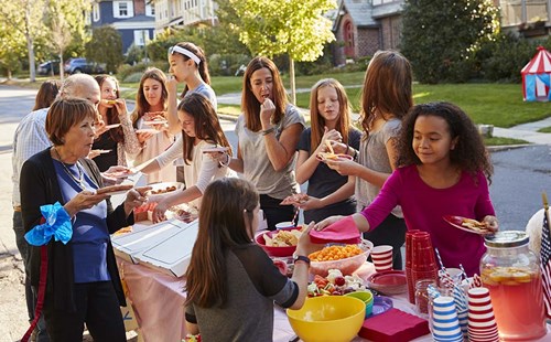 Neighbors gathering for a pot luck