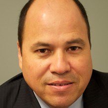 Armando Falcon headshot